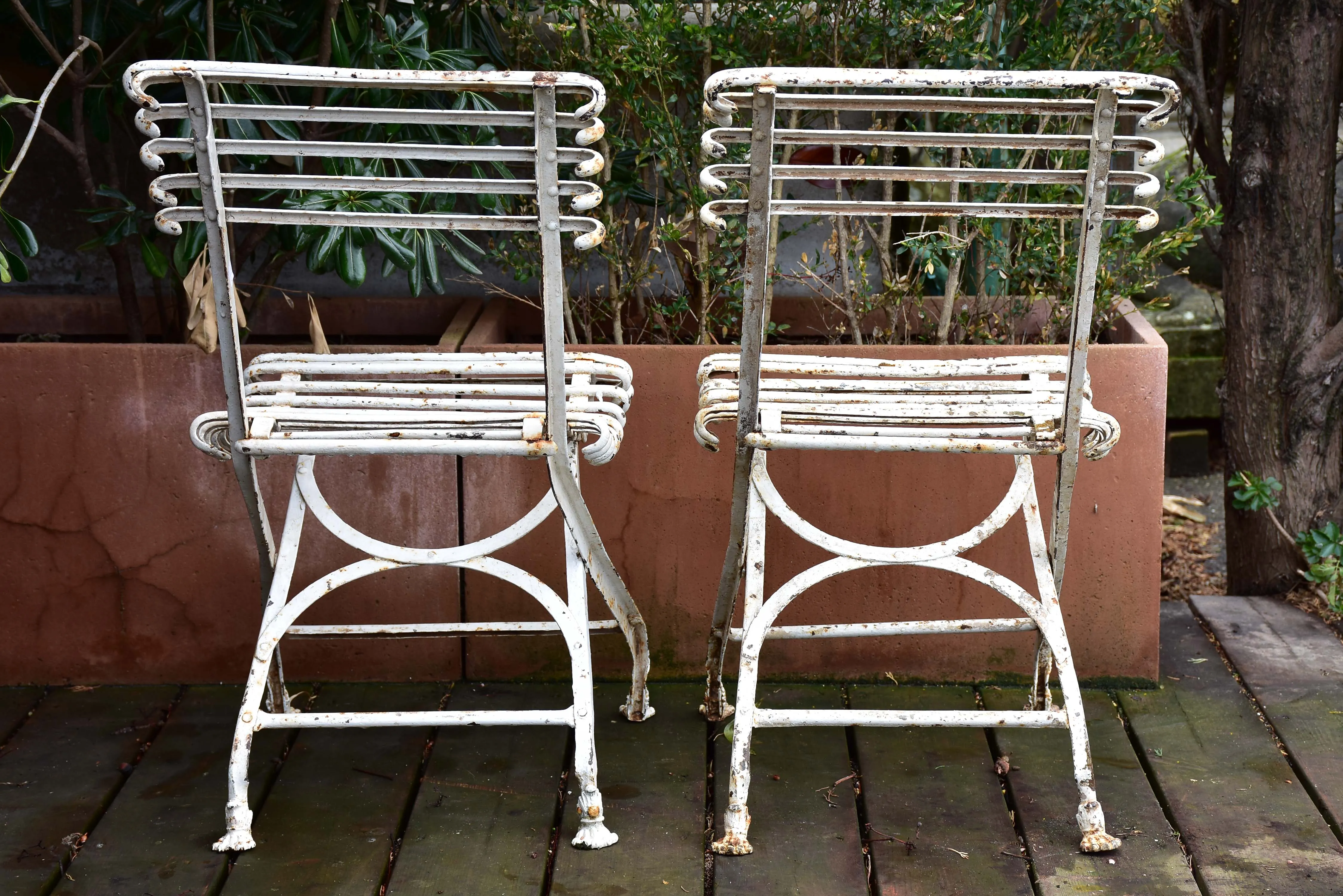 Pair of antique French folding Arras garden chairs with claw feet