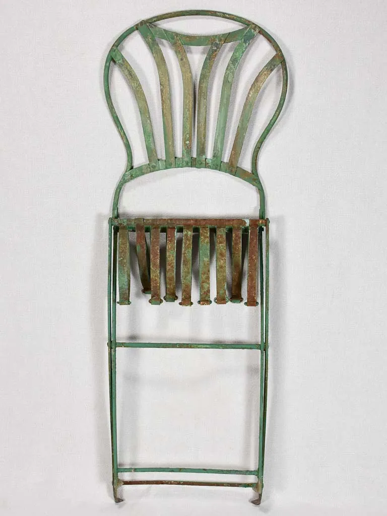 Pair of folding chairs from the military with green patina