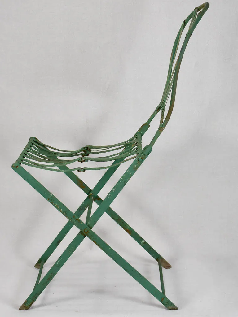 Pair of folding chairs from the military with green patina