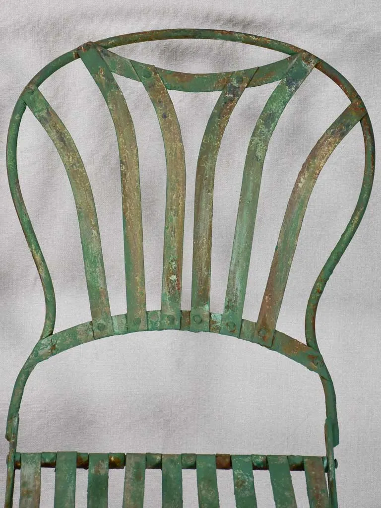Pair of folding chairs from the military with green patina