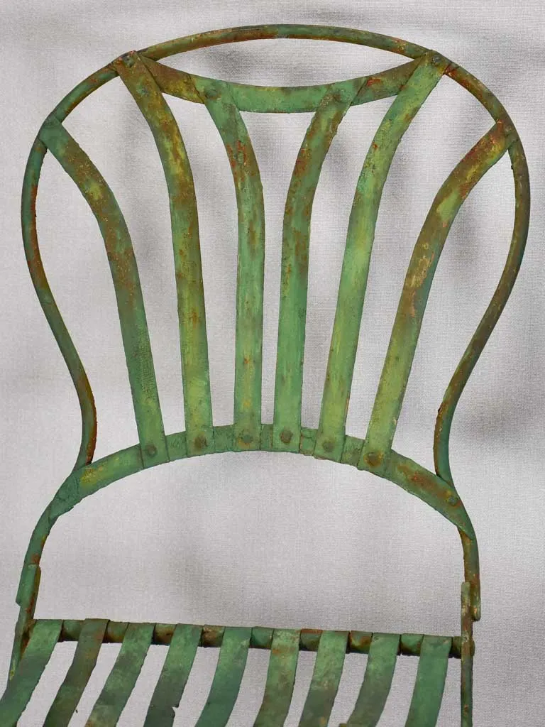 Pair of folding chairs from the military with green patina