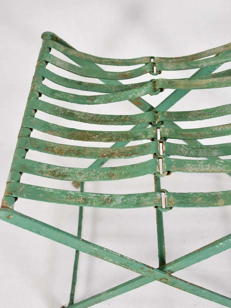 Pair of folding chairs from the military with green patina